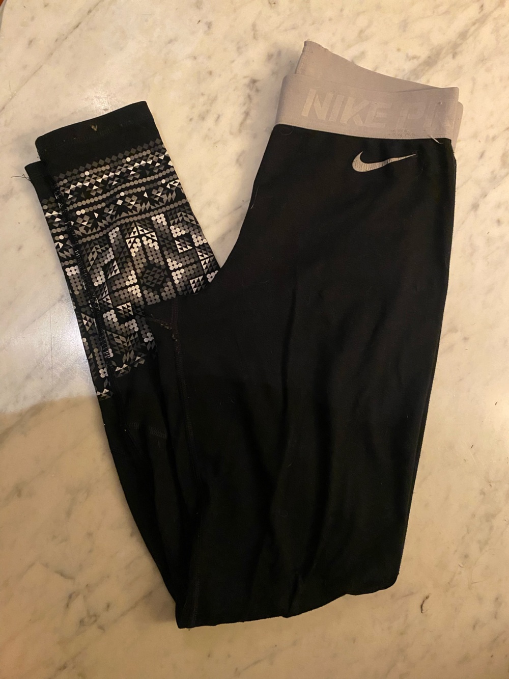 Nike Black Leggings with Gray Waistband and Patterned Lower Leg